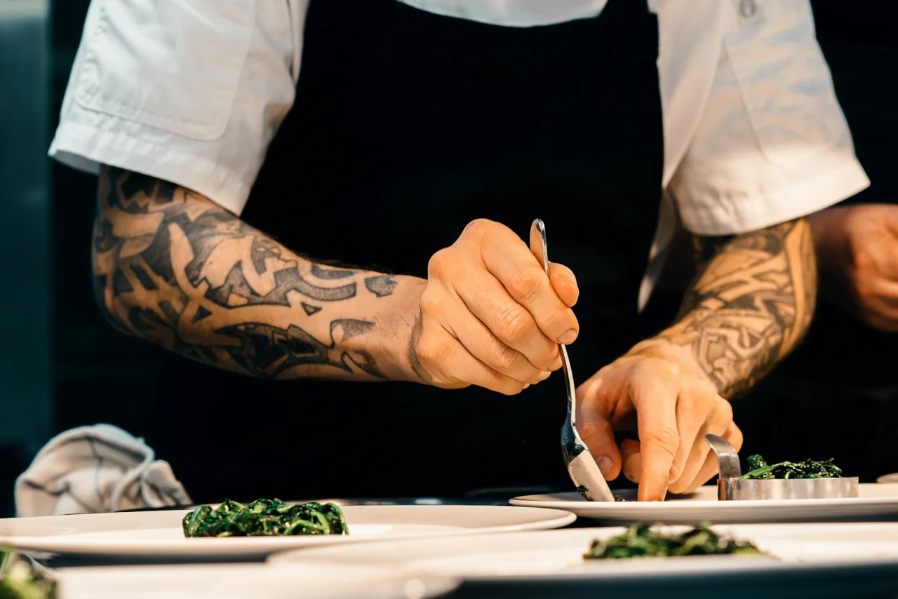 Hospitality craft: carefully plating food